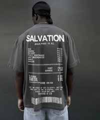 the back of a man wearing a t - shirt that says salvation